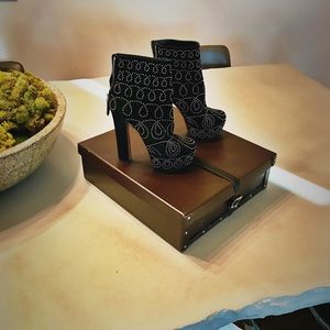 ALAIA Studded Platform Boots